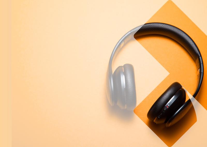 Headphones on an orange background
